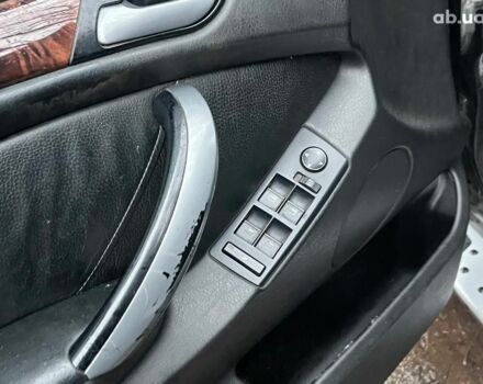 Черный БМВ Х5, объемом двигателя 3 л и пробегом 419 тыс. км за 12790 $, фото 21 на Automoto.ua