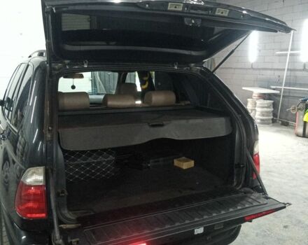 Черный БМВ Х5, объемом двигателя 3 л и пробегом 380 тыс. км за 12400 $, фото 3 на Automoto.ua