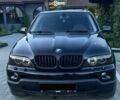 Черный БМВ Х5, объемом двигателя 3 л и пробегом 330 тыс. км за 12000 $, фото 1 на Automoto.ua