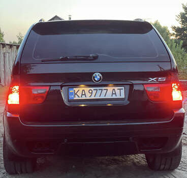 Чорний БМВ Х5, об'ємом двигуна 4.4 л та пробігом 165 тис. км за 12000 $, фото 2 на Automoto.ua