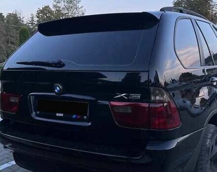 Черный БМВ Х5, объемом двигателя 3 л и пробегом 330 тыс. км за 12000 $, фото 1 на Automoto.ua