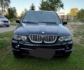 Черный БМВ Х5, объемом двигателя 3 л и пробегом 375 тыс. км за 11999 $, фото 1 на Automoto.ua