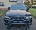 Черный БМВ Х5, объемом двигателя 3 л и пробегом 240 тыс. км за 2381 $, фото 1 на Automoto.ua