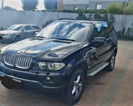 Черный БМВ Х5, объемом двигателя 3 л и пробегом 375 тыс. км за 11999 $, фото 1 на Automoto.ua