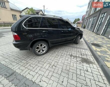Черный БМВ Х5, объемом двигателя 3 л и пробегом 285 тыс. км за 11990 $, фото 19 на Automoto.ua