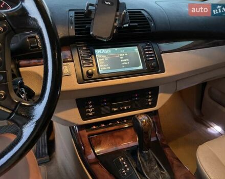 Черный БМВ Х5, объемом двигателя 3 л и пробегом 285 тыс. км за 11990 $, фото 23 на Automoto.ua