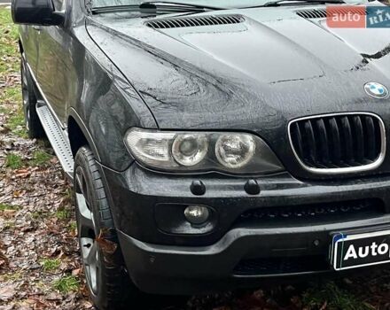 Черный БМВ Х5, объемом двигателя 3 л и пробегом 419 тыс. км за 12790 $, фото 1 на Automoto.ua