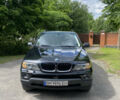 Черный БМВ Х5, объемом двигателя 3 л и пробегом 318 тыс. км за 11900 $, фото 1 на Automoto.ua