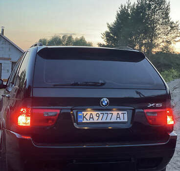 Чорний БМВ Х5, об'ємом двигуна 4.4 л та пробігом 165 тис. км за 12000 $, фото 1 на Automoto.ua