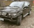 Черный БМВ Х5, объемом двигателя 3 л и пробегом 265 тыс. км за 10600 $, фото 1 на Automoto.ua