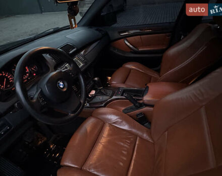 Черный БМВ Х5, объемом двигателя 2.98 л и пробегом 313 тыс. км за 14000 $, фото 15 на Automoto.ua