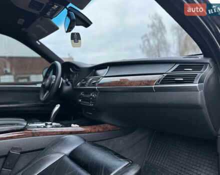Черный БМВ Х5, объемом двигателя 3 л и пробегом 270 тыс. км за 12250 $, фото 92 на Automoto.ua