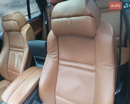 Черный БМВ Х5, объемом двигателя 4.8 л и пробегом 266 тыс. км за 13000 $, фото 3 на Automoto.ua