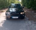 Черный БМВ Х5, объемом двигателя 3 л и пробегом 284 тыс. км за 12700 $, фото 1 на Automoto.ua