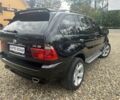 Чорний БМВ Х5, об'ємом двигуна 3 л та пробігом 320 тис. км за 11199 $, фото 4 на Automoto.ua