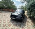 Черный БМВ Х5, объемом двигателя 4.8 л и пробегом 230 тыс. км за 10000 $, фото 3 на Automoto.ua