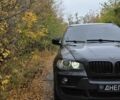 Черный БМВ Х5, объемом двигателя 3 л и пробегом 400 тыс. км за 10000 $, фото 1 на Automoto.ua