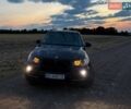 Черный БМВ Х5, объемом двигателя 3 л и пробегом 320 тыс. км за 14699 $, фото 1 на Automoto.ua