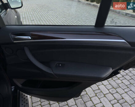 Чорний БМВ Х5, об'ємом двигуна 3 л та пробігом 110 тис. км за 12900 $, фото 81 на Automoto.ua