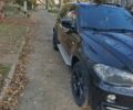 Чорний БМВ Х5, об'ємом двигуна 3 л та пробігом 350 тис. км за 13700 $, фото 2 на Automoto.ua