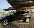 Чорний БМВ Х5, об'ємом двигуна 3 л та пробігом 286 тис. км за 14799 $, фото 2 на Automoto.ua