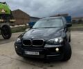 Чорний БМВ Х5, об'ємом двигуна 3 л та пробігом 215 тис. км за 14011 $, фото 1 на Automoto.ua