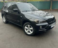 Черный БМВ Х5, объемом двигателя 3 л и пробегом 300 тыс. км за 12500 $, фото 1 на Automoto.ua