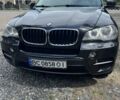 Черный БМВ Х5, объемом двигателя 3 л и пробегом 330 тыс. км за 16950 $, фото 1 на Automoto.ua