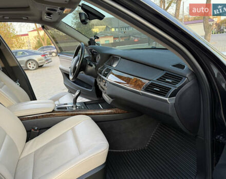 Черный БМВ Х5, объемом двигателя 3 л и пробегом 297 тыс. км за 16900 $, фото 16 на Automoto.ua