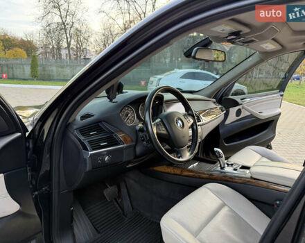 Черный БМВ Х5, объемом двигателя 3 л и пробегом 297 тыс. км за 16900 $, фото 21 на Automoto.ua
