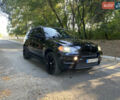 Чорний БМВ Х5, об'ємом двигуна 3 л та пробігом 206 тис. км за 18000 $, фото 3 на Automoto.ua