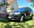 Черный БМВ Х5, объемом двигателя 3 л и пробегом 229 тыс. км за 21500 $, фото 1 на Automoto.ua