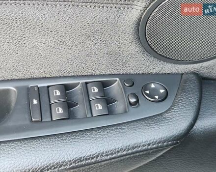 Чорний БМВ Х5, об'ємом двигуна 3 л та пробігом 218 тис. км за 17750 $, фото 79 на Automoto.ua