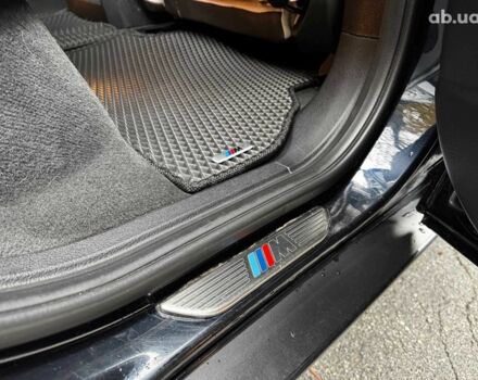 Черный БМВ Х5, объемом двигателя 3 л и пробегом 158 тыс. км за 18690 $, фото 32 на Automoto.ua