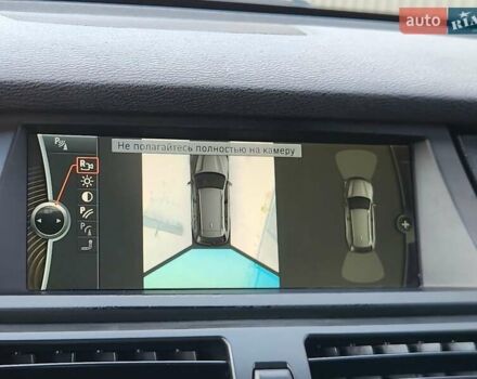 Чорний БМВ Х5, об'ємом двигуна 3 л та пробігом 218 тис. км за 17750 $, фото 78 на Automoto.ua