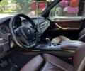 Чорний БМВ Х5, об'ємом двигуна 3 л та пробігом 214 тис. км за 22900 $, фото 4 на Automoto.ua
