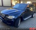 Черный БМВ Х5, объемом двигателя 4.4 л и пробегом 83 тыс. км за 23600 $, фото 1 на Automoto.ua