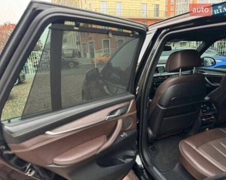 Чорний БМВ Х5, об'ємом двигуна 3 л та пробігом 126 тис. км за 31000 $, фото 28 на Automoto.ua