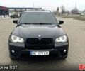 Черный БМВ Х5, объемом двигателя 3 л и пробегом 243 тыс. км за 25000 $, фото 1 на Automoto.ua