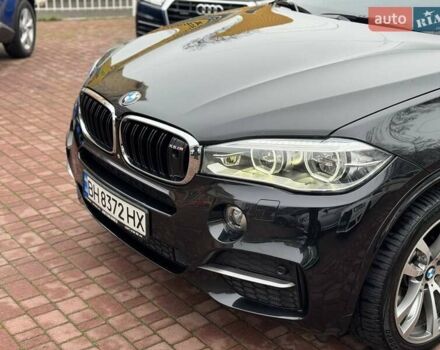 Чорний БМВ Х5, об'ємом двигуна 3 л та пробігом 126 тис. км за 31000 $, фото 2 на Automoto.ua