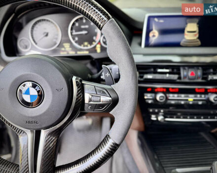 Черный БМВ Х5, объемом двигателя 3 л и пробегом 235 тыс. км за 29950 $, фото 27 на Automoto.ua