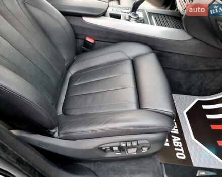 Черный БМВ Х5, объемом двигателя 3 л и пробегом 258 тыс. км за 34700 $, фото 79 на Automoto.ua