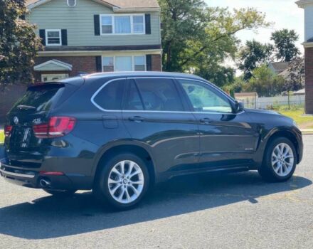 Чорний БМВ Х5, об'ємом двигуна 3 л та пробігом 85 тис. км за 9500 $, фото 4 на Automoto.ua