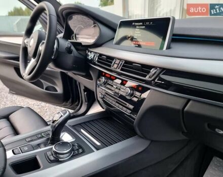 Черный БМВ Х5, объемом двигателя 3 л и пробегом 258 тыс. км за 34700 $, фото 81 на Automoto.ua