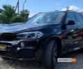 Черный БМВ Х5, объемом двигателя 3 л и пробегом 167 тыс. км за 24700 $, фото 2 на Automoto.ua