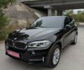 Черный БМВ Х5, объемом двигателя 3 л и пробегом 314 тыс. км за 16700 $, фото 1 на Automoto.ua