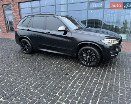 Черный БМВ Х5, объемом двигателя 3 л и пробегом 141 тыс. км за 41000 $, фото 1 на Automoto.ua