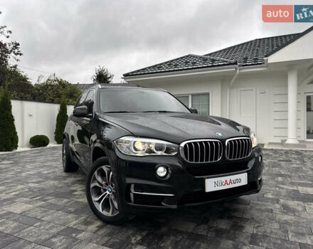 Черный БМВ Х5, объемом двигателя 3 л и пробегом 83 тыс. км за 23800 $, фото 1 на Automoto.ua