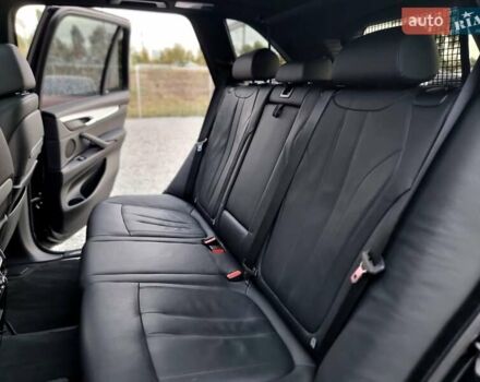 Черный БМВ Х5, объемом двигателя 3 л и пробегом 258 тыс. км за 34700 $, фото 69 на Automoto.ua