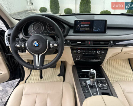 Черный БМВ Х5, объемом двигателя 3 л и пробегом 83 тыс. км за 23800 $, фото 61 на Automoto.ua